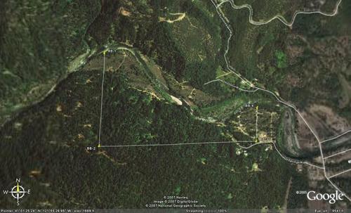aerial image...white lines indicate property lines and the river is the north boundary california