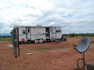 Camper is hooked to RV site #1 and site # 2 hookup is at the elec. pedestal.