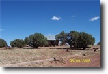 20 Acre parcel with unfinished cabin