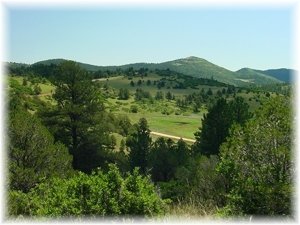 Views of the surrounding mountains and valleys.
