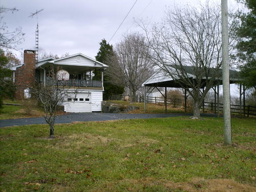 side view of home showing garage and carport kentucky