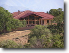 Spanish/Med home on 21 acres w/barn