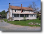314 Acre Farm with 3 Houses and Cabin