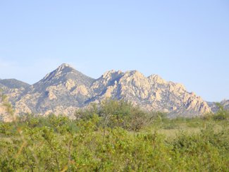 The Dragoon Mountains located in the Coronado National Forest to the east.