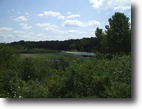 25 rolling acres w/prairies & ponds