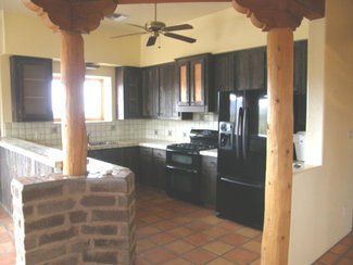Looking into the kitchen from the great room. The home has a wonderful open floor plan.