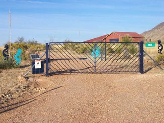 The 36+ acres is fenced with a solar entry gate.