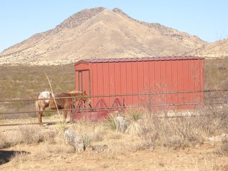 The horse facility with the mountains to the northeast.
