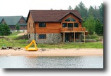 Wisconsin Waterfront 1 Acres Brand New lakefront log home with Beach Fr