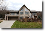 Custom quality home overlooking Lake Wisc.